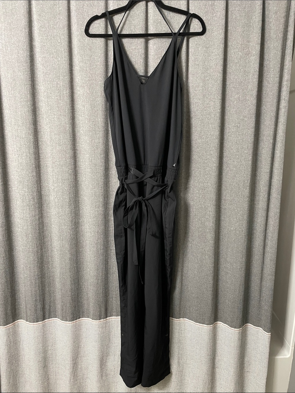 Fabletics Black Sleeveless V-Neck Jumpsuit with Waist Tie